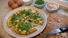 Italienisches Ofen-Omelett mit Erbsen und Rucola – schnell, saftig und ohne Wenden